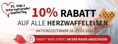 Das Bild zeigt eine Herzwaffel neben einem schwarzen Cloer Waffeleisen. 